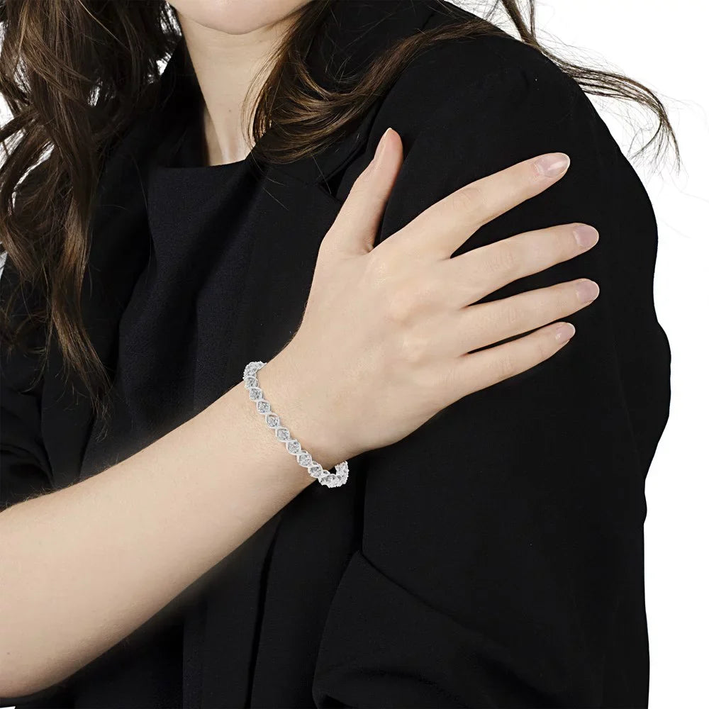 .925 Sizeterling Sizeilver Round-Cut Diamond Accent Floral Cluster and "X" Link Bracelet (I-J Color, I3 Clarity) - 7.25"