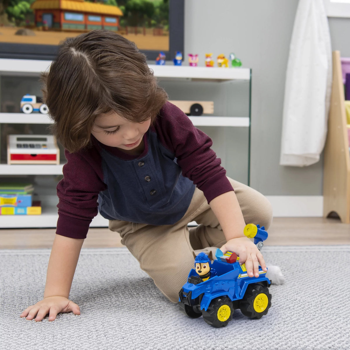 PAW Patrol, Dino Rescue Chase’s Deluxe Rev Up Vehicle with Mystery Dinosaur Figure